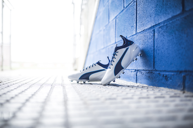 Puma evoTOUCH cleats in white and blue