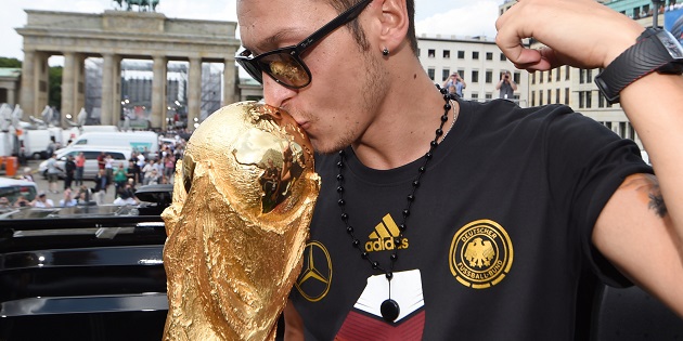 Ozil with World Cup trophy