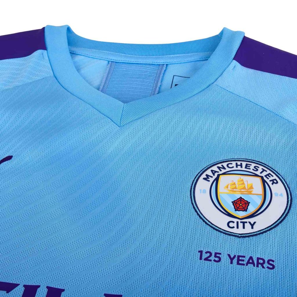man city with puma