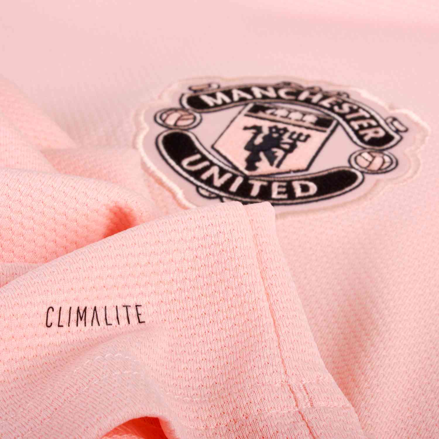 manchester united peach jersey