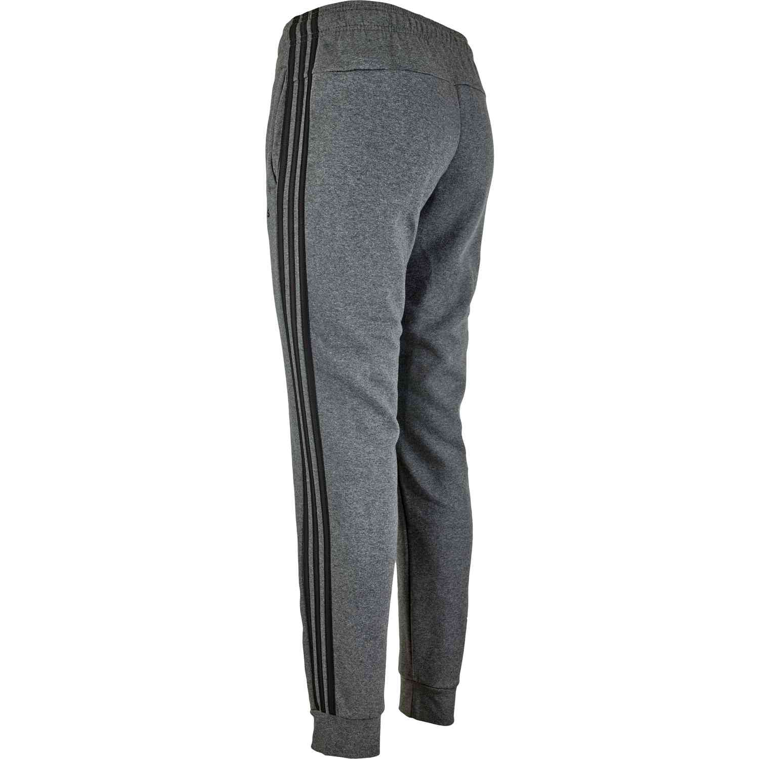 grey adidas pants with black stripes